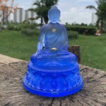 Tượng Phật A Di Đà để ô tô xanh biển