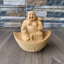 Tượng Phật Di Lạc Ngồi Trên Thỏi Vàng